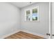 Bedroom with a window providing natural light and hardwood floors at 1803 Ballard Rd # Holly Craftsman, Fuquay Varina, NC 27526