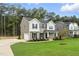 Beautiful two-story home with a two car garage, landscaped front yard and well manicured lawn at 1803 Ballard Rd # Holly Craftsman, Fuquay Varina, NC 27526