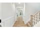 Hallway leading to living area and stairs to the second story at 1803 Ballard Rd # Holly Craftsman, Fuquay Varina, NC 27526