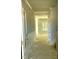 Bright hallway showcases paneled walls and leads to additional rooms within the home at 1803 Ballard Rd # Holly Craftsman, Fuquay Varina, NC 27526