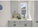 Bright kitchen nook with gray cabinets and a view out the window above the sink at 1803 Ballard Rd # Holly Craftsman, Fuquay Varina, NC 27526