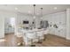 Stylish kitchen with a center island featuring bar seating, perfect for casual dining at 1803 Ballard Rd # Holly Craftsman, Fuquay Varina, NC 27526