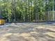 Cleared land ready for construction, offering a serene backdrop of lush trees at 1803 Ballard Rd # Holly Craftsman, Fuquay Varina, NC 27526
