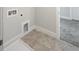 Laundry room with tile flooring and hookups for washer and dryer at 1803 Ballard Rd # Holly Craftsman, Fuquay Varina, NC 27526
