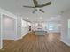 Open-concept living area connecting the kitchen, dining, and living spaces with recessed lighting at 1803 Ballard Rd # Holly Craftsman, Fuquay Varina, NC 27526