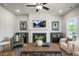 Relaxing living room with a fireplace and decorative cabinets flanking the mantel at 1803 Ballard Rd # Holly Craftsman, Fuquay Varina, NC 27526