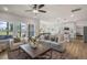 Open concept living room with plenty of seating, natural light and view into the kitchen at 1803 Ballard Rd # Holly Craftsman, Fuquay Varina, NC 27526