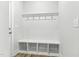 Mudroom featuring coat hooks, seating, and shelving for shoe storage at 1803 Ballard Rd # Holly Craftsman, Fuquay Varina, NC 27526
