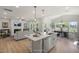 Open concept living, kitchen, and dining space offers seamless flow and a bright atmosphere at 1803 Ballard Rd # Holly Craftsman, Fuquay Varina, NC 27526