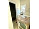 Pantry with wire shelving, located next to a window and featuring a quartz countertop at 1803 Ballard Rd # Holly Craftsman, Fuquay Varina, NC 27526