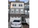 Charming townhome exterior with brick accents and a well-maintained front yard at 1833 Fahey Dr, Apex, NC 27502