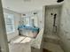 Elegant bathroom with double vanity, large mirror, and a luxurious marble shower at 1849 Ballard Rd # Holly Georgian, Fuquay Varina, NC 27526