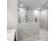 Luxurious bathroom featuring a glass-enclosed shower with marble tile surround and rain shower head at 1849 Ballard Rd # Holly Georgian, Fuquay Varina, NC 27526