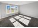 Bedroom boasting a large window bringing in plenty of natural light at 1849 Ballard Rd # Holly Georgian, Fuquay Varina, NC 27526