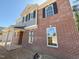 New brick home with black shutters and light gray siding at 1849 Ballard Rd # Holly Georgian, Fuquay Varina, NC 27526