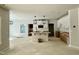 Open concept kitchen with island and modern light fixtures at 1849 Ballard Rd # Holly Georgian, Fuquay Varina, NC 27526