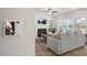Inviting living room with a cozy fireplace, a modern smart home device, and comfortable seating at 1849 Ballard Rd # Holly Georgian, Fuquay Varina, NC 27526