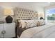 Well-lit main bedroom features a neutral color palette and minimalist decor at 1849 Ballard Rd # Holly Georgian, Fuquay Varina, NC 27526