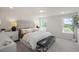 The main bedroom features large windows and neutral colors at 1849 Ballard Rd # Holly Georgian, Fuquay Varina, NC 27526