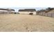 Large backyard area fully enclosed with wooden fence and small back deck at 20 Patterson Dr, Angier, NC 27501