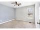 Bedroom with neutral carpet, ceiling fan, and a window to let in natural light at 20 Patterson Dr, Angier, NC 27501