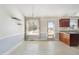 Bright dining area with natural light, featuring tile flooring and a view of the backyard at 20 Patterson Dr, Angier, NC 27501