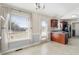 Eat-in kitchen with bright windows, rear access, dark wood cabinets and granite counters at 20 Patterson Dr, Angier, NC 27501