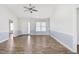 Bright and airy living room showcasing hardwood floors and natural light from large windows at 20 Patterson Dr, Angier, NC 27501