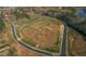 Aerial view of new home development with roads and vacant lots at 2005 Anna Lilley Dr # 53, Fuquay Varina, NC 27526