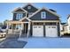 Beautiful two-story home with stone accents, covered porch and two-car garage at 2005 Anna Lilley Dr # 53, Fuquay Varina, NC 27526