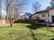 Fenced-in backyard featuring a deck and patio area, connecting seamlessly to the home's exterior at 2116 Leadenhall Way, Raleigh, NC 27603