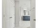 Bathroom featuring a single vanity, white marble floors, and glass shower at 22 Whistling Way # 18, Lillington, NC 27546
