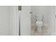 Clean bathroom with a white toilet and marble tile flooring at 22 Whistling Way # 18, Lillington, NC 27546