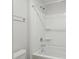 Clean bathroom features a shower-tub combo, white fixtures, and neutral walls at 22 Whistling Way # 18, Lillington, NC 27546
