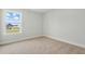 Bedroom with a window providing bright natural light and a peaceful atmosphere at 22 Whistling Way # 18, Lillington, NC 27546