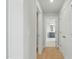 Hallway featuring carpet, white walls, closet and bathroom at 22 Whistling Way # 18, Lillington, NC 27546