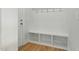 Mudroom features coat hooks, built-in bench, and storage cubbies near entryway at 22 Whistling Way # 18, Lillington, NC 27546