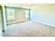 Bedroom with carpet floors and a backyard view at 22 Whistling Way # Holly Farmhouse, Lillington, NC 27546