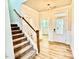 Foyer with stairs and a view to the front door at 22 Whistling Way # Holly Farmhouse, Lillington, NC 27546