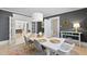 Open dining area with view into the living room at 230 E Park Dr, Raleigh, NC 27605