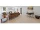 Bright living room with hardwood floors, a decorative fireplace, and modern decor at 230 E Park Dr, Raleigh, NC 27605
