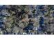 An aerial view of a neighborhood featuring tree-lined streets and a mix of single-Gathering homes at 306 N Driver St, Durham, NC 27703