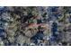 Aerial view of property highlighting its generous lot size, mature trees, and location within a residential area at 306 N Driver St, Durham, NC 27703