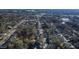 Wide aerial shot of a quiet neighborhood with tree coverage and winding streets at 306 N Driver St, Durham, NC 27703