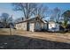 Classic home with a functional side entrance, surrounded by a peaceful and leafy environment at 306 N Driver St, Durham, NC 27703