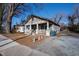 Beautiful craftsman home featuring a welcoming porch and a well-maintained yard, perfect for relaxation at 306 N Driver St, Durham, NC 27703