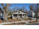 Cozy home with a classic front porch, offering a glimpse of neighborhood charm and tranquility at 306 N Driver St, Durham, NC 27703