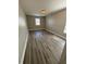 Spacious bedroom with light walls and a large window at 3144 La Costa Way, Raleigh, NC 27610