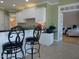 Bright kitchen with white cabinetry and black countertops at 325 Sandy Ridge Rd, Dunn, NC 28334