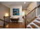 Open hallway featuring hardwood floors, neutral walls, and staircase at 340 Rose Walk Ln, Carrboro, NC 27510